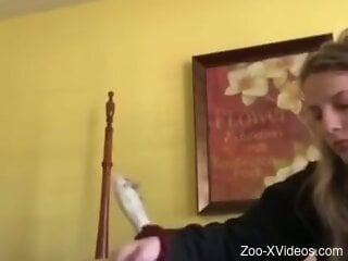 Slender blonde woman filmed at home in true zoo kinks